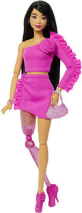 Barbie Deluxe Style with Black Hair and Glittery Prosthetic Leg, Pink Top and Skirt Set with Rose Detail and Accessories